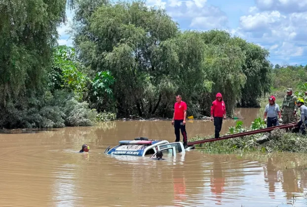 patrulla arrollada por el rio atoyac