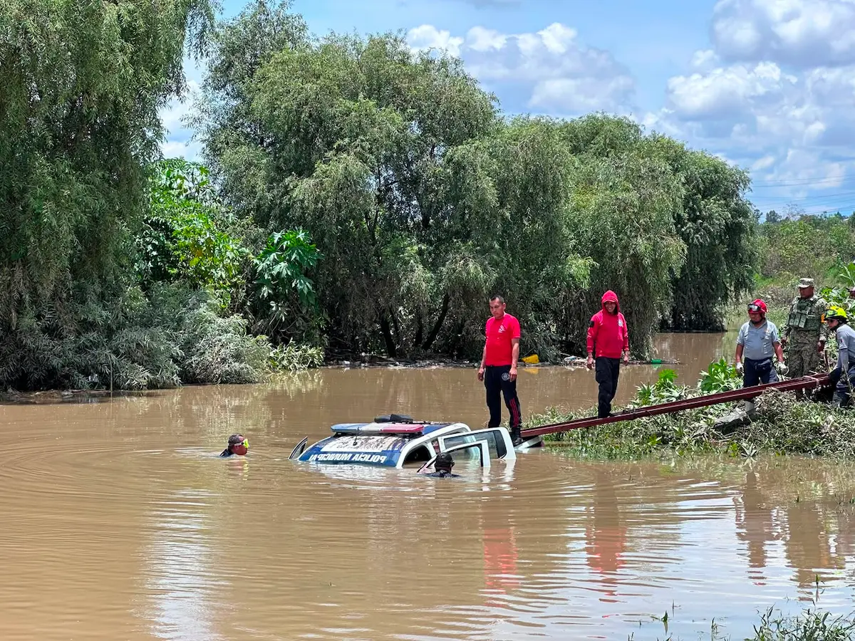 patrulla arrollada por el rio atoyac