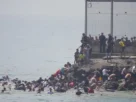 iles de personas han intentado acceder a Ceuta por tierra y nadando