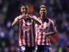 Roberto "Piojo" Alvarado celebra el gol del empate ante el Puebla