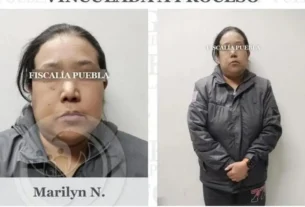 Marilyn Cote al momento de ser presentada ante las autoridades.