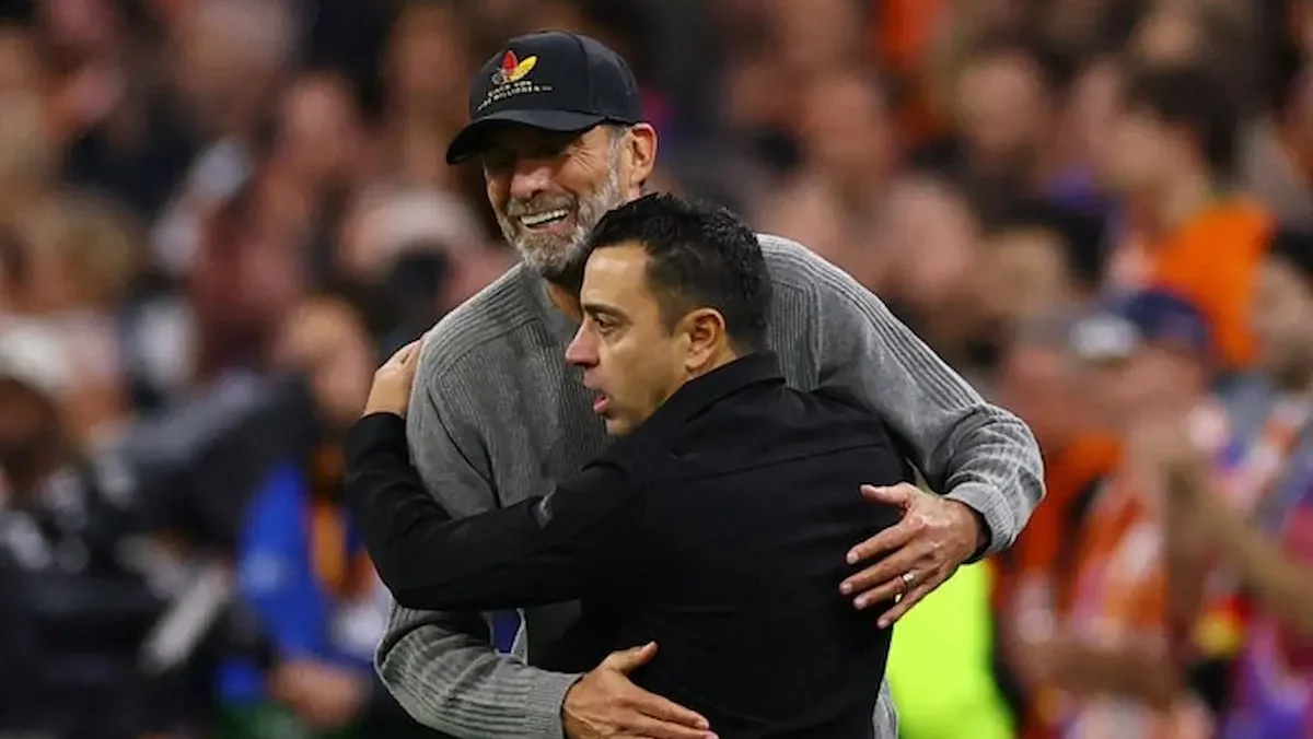 Jürgen Klopp y Xavi Hernández