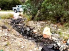 El accidente representó el derrame de 12 mil litros de ácido sulfúrico sobre la carretera y el suelo natural.