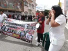 Trabajadores del IMSS se reunieron en el estacionamiento de Plaza Dorada, punto de donde partieron hacia las oficinas sindicales del Instituto Mexicano del Seguro Social (IMSS), sobre la 4 Sur, entre 11 y 13 Oriente.